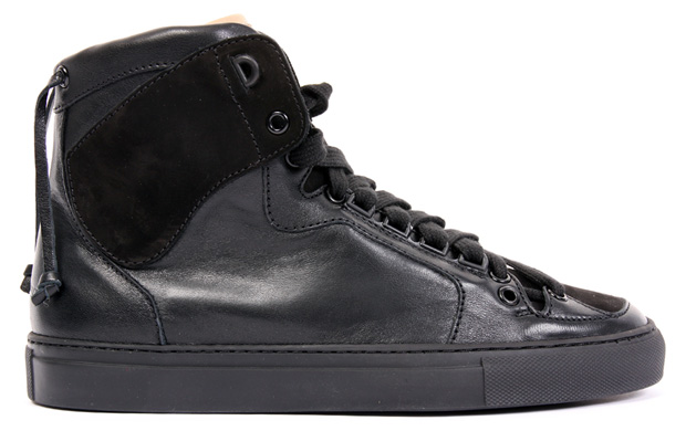 black leather sneakers. lack leather upper with