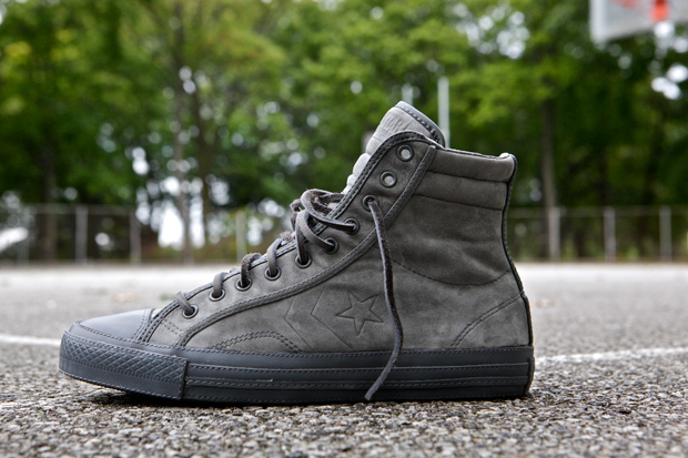 grey high tops converse. The hi-top sneaker features a